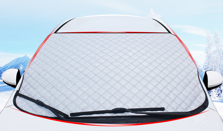 Windscreen frost cover fitted to a car windscreen in winter