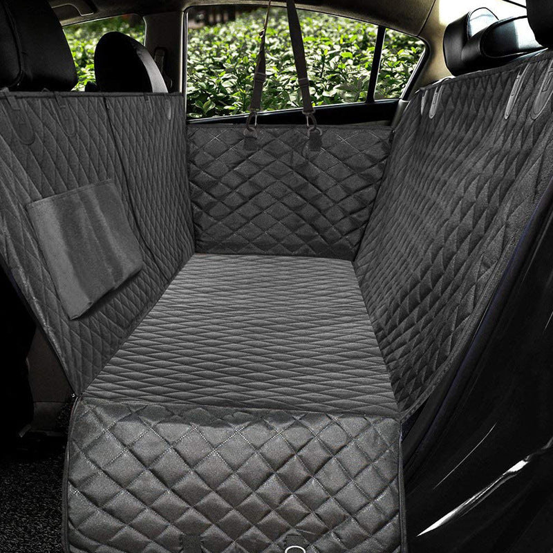 Water-resistant dog car seat hammock covering a car back seat
